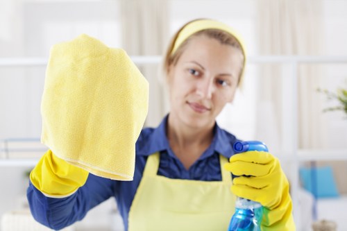 Commercial cleaners working in a TW7 office reception area